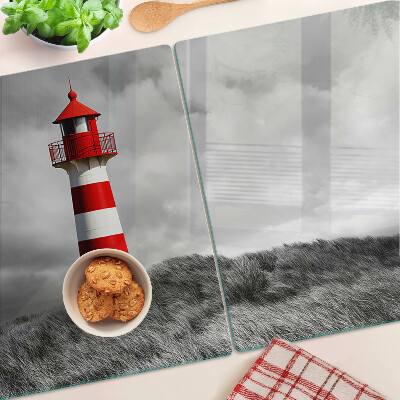 Snijplanken glas Een vuurtoren in het landschap