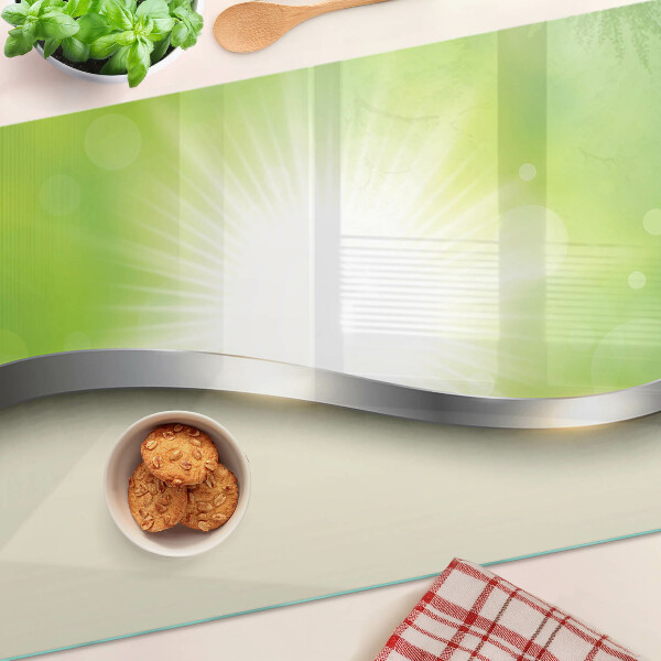 Snijplanken van glas Groene bokeh met lichtstralen