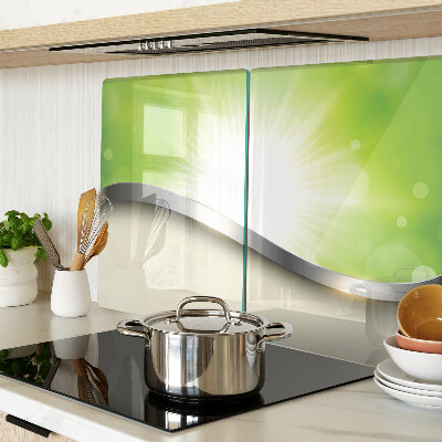 Snijplanken van glas Groene bokeh met lichtstralen