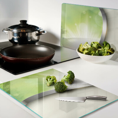 Snijplanken van glas Groene bokeh met lichtstralen