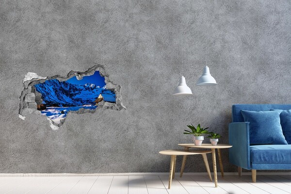 3D sticker gat in stenen muur Winterhuisje in de bergen
