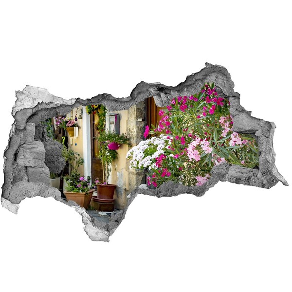 3D muursticker gescheurde muur Een bloemenhoekje in de stad