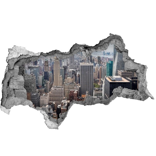 3D muursticker gescheurde muur Uitzicht op de stad vanuit een gat in de muur.