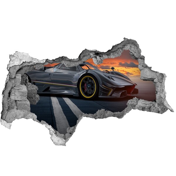 3D sticker gat in stenen muur Een raceauto op het circuit.