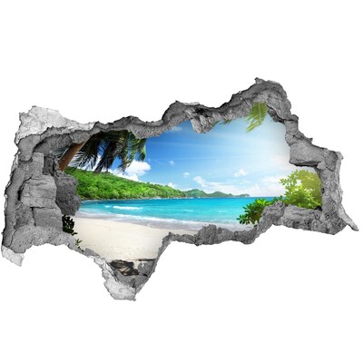 Zelfklevende 3D wandsticker illusie Caribisch strand door een gat in de muur