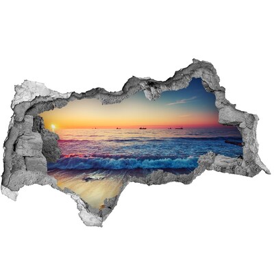 3D muursticker gescheurde muur Zonsondergang boven de zee