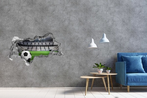 3D sticker gat in stenen muur Voetbalstadion met een bal