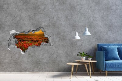 3D muursticker gescheurde muur Bloemenlandschap bij zonsondergang