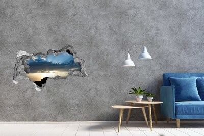 3D muursticker gescheurde muur Zonsondergang boven de zee