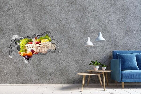 3D sticker gat in stenen muur Een mand vol fruit