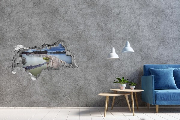 3D muursticker gescheurde muur Een brug op het water