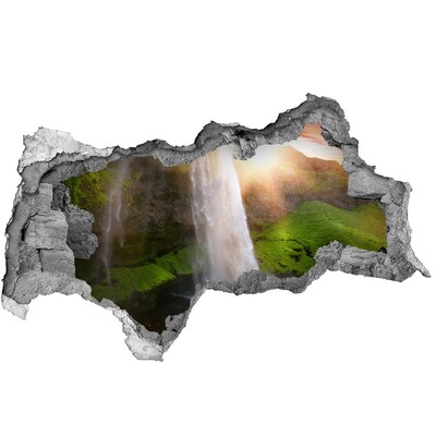 3D muursticker gescheurde muur Een waterval in een groen landschap