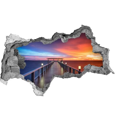 3D muursticker gescheurde muur Zonsondergang boven de pier