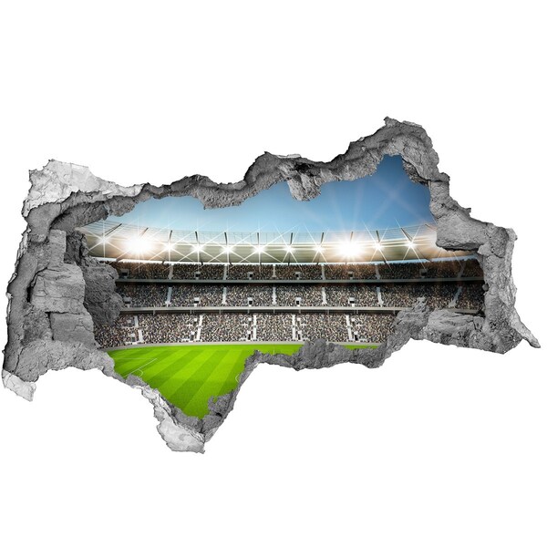 3D sticker gat in stenen muur Het voetbalstadion in actie.