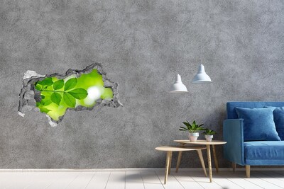 Zelfklevende 3D wandsticker illusie Een groene oase in beton.