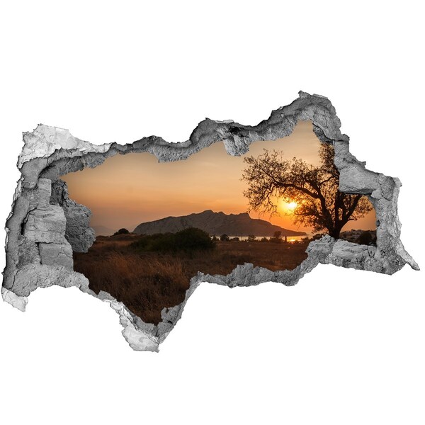 3D muursticker gescheurde muur Zonsondergang boven een berglandschap