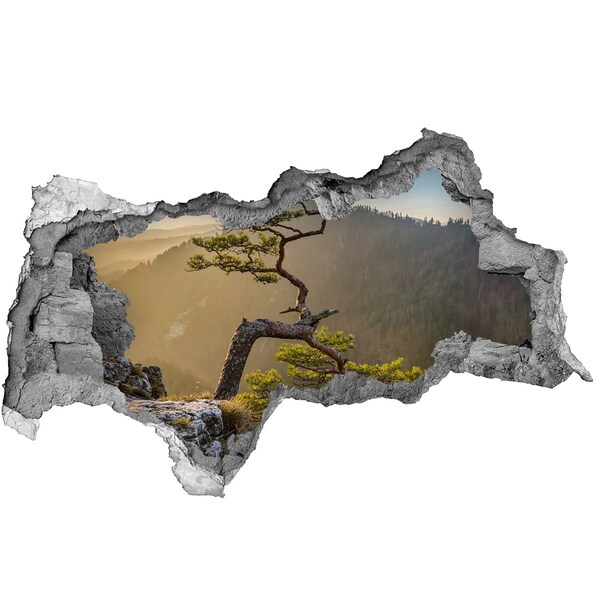3D sticker gat in stenen muur Berglandschap met een boom