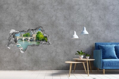 Zelfklevende 3D wandsticker illusie Uitzicht op Parijs door een gat in de muur.