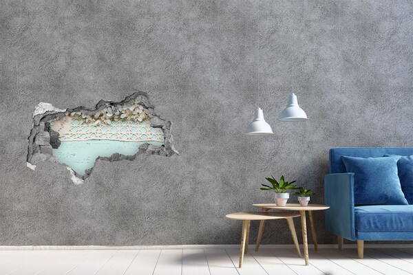 3D sticker gat in stenen muur Bloemenmotief op een blauwe houten achtergrond