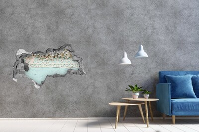 3D sticker gat in stenen muur Bloemenmotief op een blauwe houten achtergrond