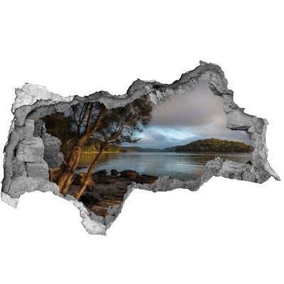 3D sticker gat in stenen muur Rust aan het water