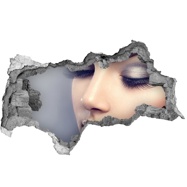 3D sticker gat in stenen muur Een charmant strand met uitzicht op zee.