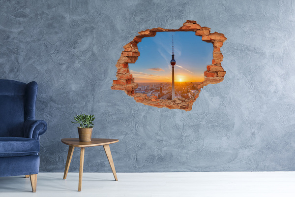 Grote 3D muursticker gat in de muur Zonsondergang boven Berlijn