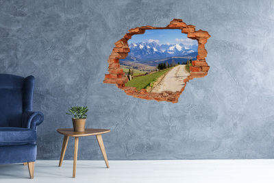 Grote 3D muursticker gat in de muur Berglandschap achter het gat in de muur