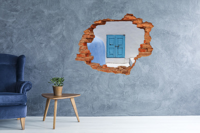 Vinyl muursticker 3D breekeffect Een kapotte muur met een blauwe deur.