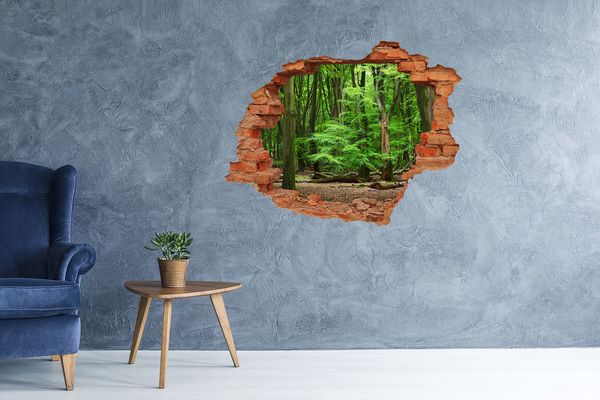 Vinyl muursticker 3D breekeffect Groen bos in een gat in de muur