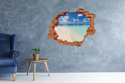 Vinyl muursticker 3D breekeffect Een paradijselijk strand met turquoise water.