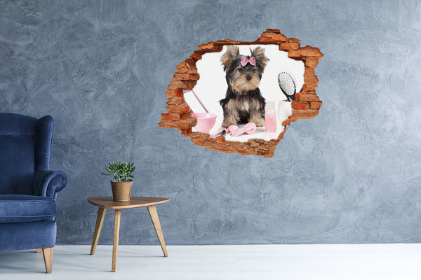 Grote 3D muursticker gat in de muur Een schattige Yorkshire Terrier met een roze strik.