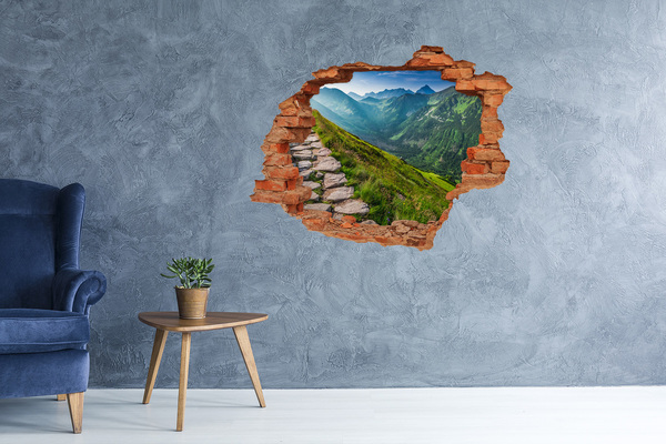 Vinyl muursticker 3D breekeffect Berglandschap achter het gat in de muur