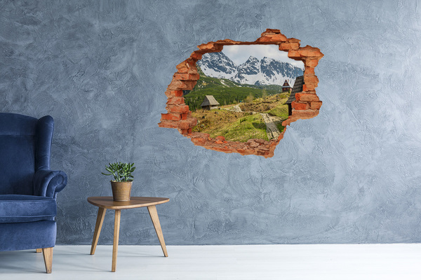 Vinyl muursticker 3D breekeffect Berglandschap met een dorp