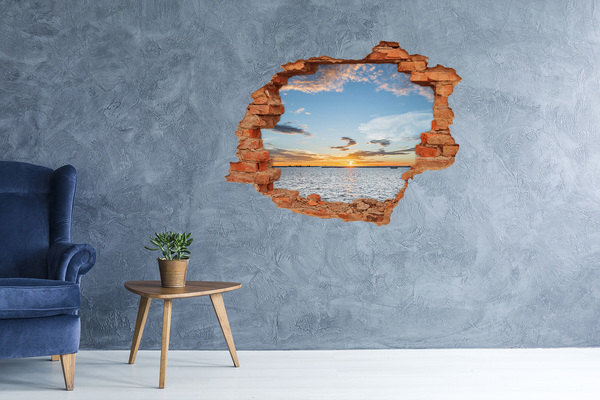 Vinyl muursticker 3D breekeffect Zonsondergang boven de zee