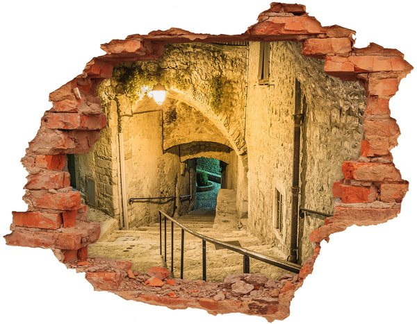 Vinyl muursticker 3D breekeffect Een historische straat in de oude binnenstad.