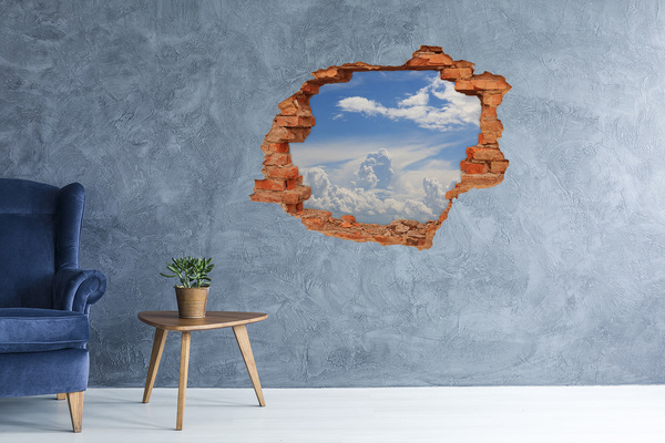 Grote 3D muursticker gat in de muur De hemel is vol wolken.