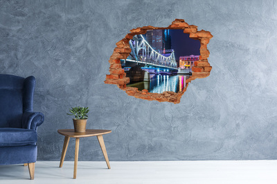 Vinyl muursticker 3D breekeffect De brug is 's nachts verlicht.