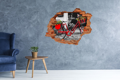 Vinyl muursticker 3D breekeffect Een rode fiets in een stedelijke omgeving
