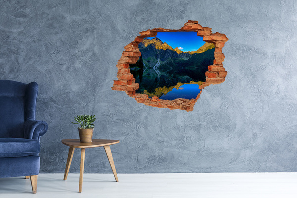 Grote 3D muursticker gat in de muur Berglandschap met een meer