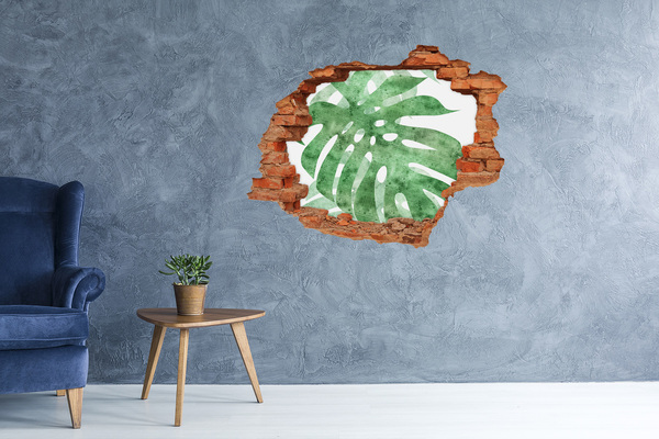 Grote 3D muursticker gat in de muur Groen blad in een beschadigde muur