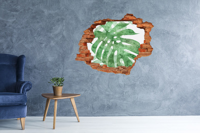 Grote 3D muursticker gat in de muur Groen blad in een beschadigde muur