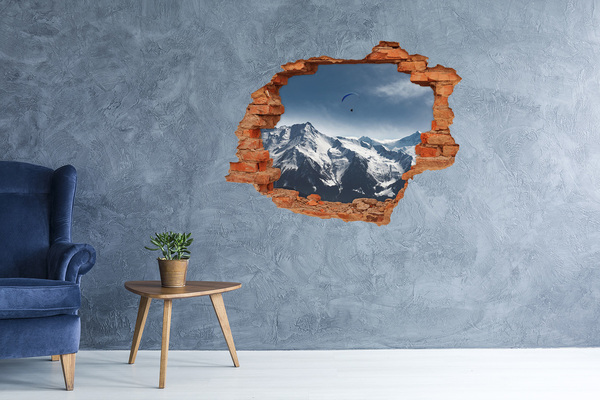 Grote 3D muursticker gat in de muur Berglandschap met een paraglider