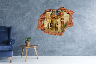 Grote 3D muursticker gat in de muur Een vervallen huis in een pittoreske omgeving.