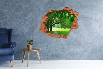 Vinyl muursticker 3D breekeffect Groen park in de zon