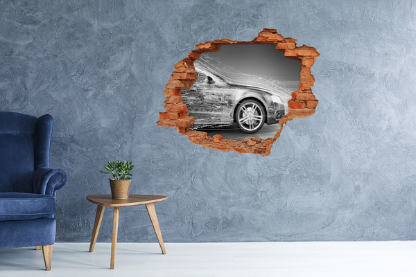Vinyl muursticker 3D breekeffect Een auto rijdt dwars door een muur.