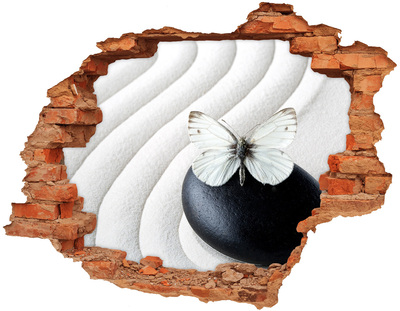 Vinyl muursticker 3D breekeffect Een vlinder op een steen in een zen-omgeving.