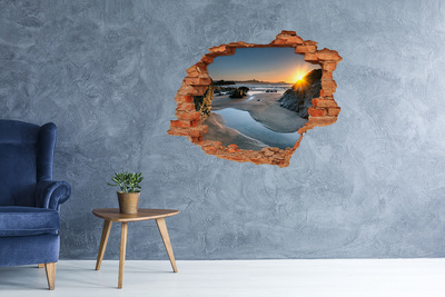 Vinyl muursticker 3D breekeffect Zonsondergang boven het strand