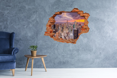 Grote 3D muursticker gat in de muur New York bij zonsondergang
