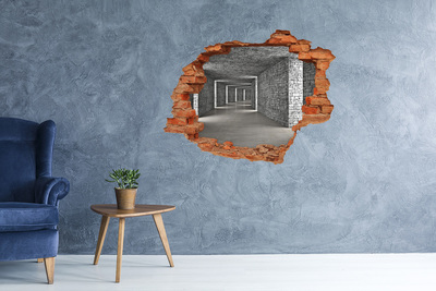 Grote 3D muursticker gat in de muur Een ingestorte muur die uitkijkt over een lege ruimte.